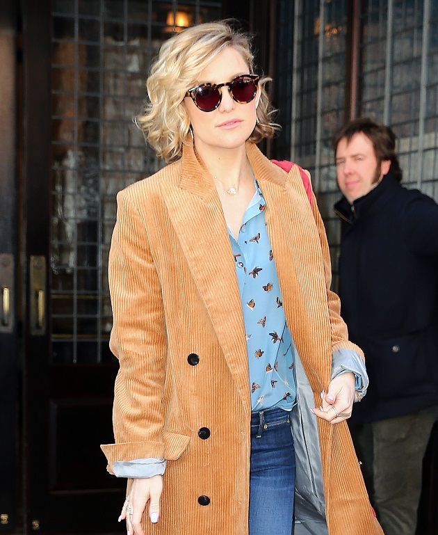 Kate Hudson heads out of her hotel in NYC wearing a sable coat and blue blouse