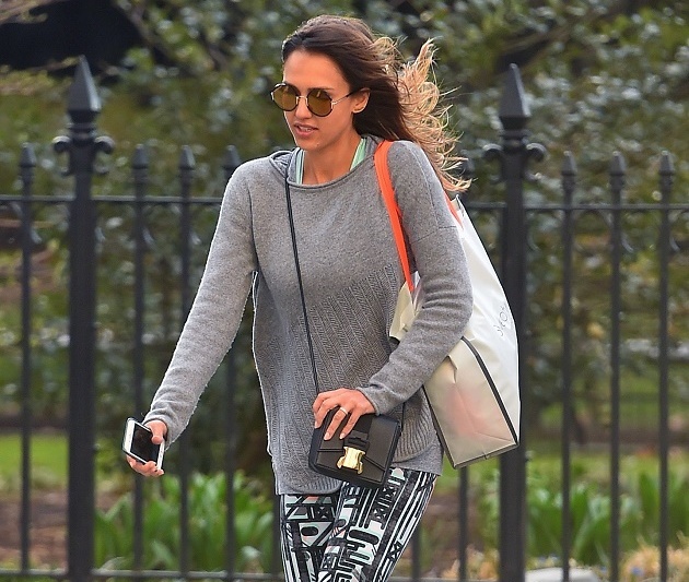 Jessica Alba strolls through Madison Square Park on a windy day in NYC