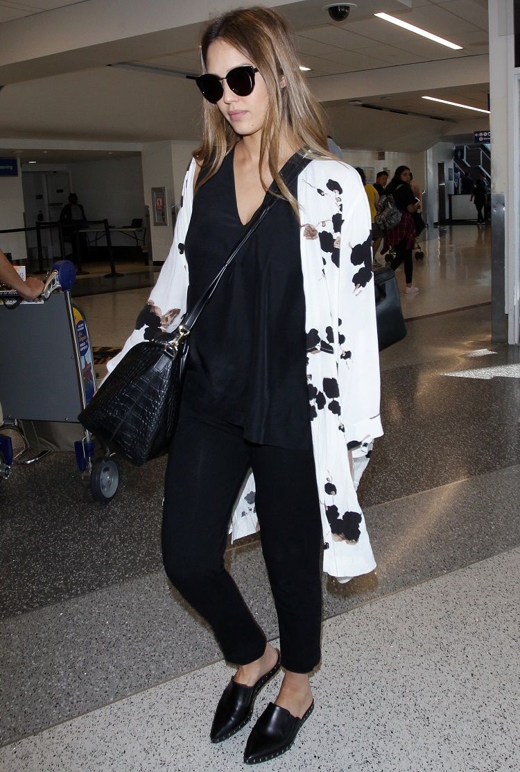 Jessica Alba arrives at the Los Angeles International Airport