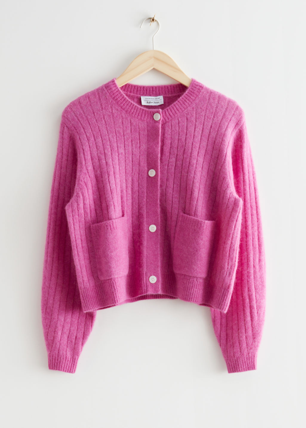 rozi džemper s gumbima